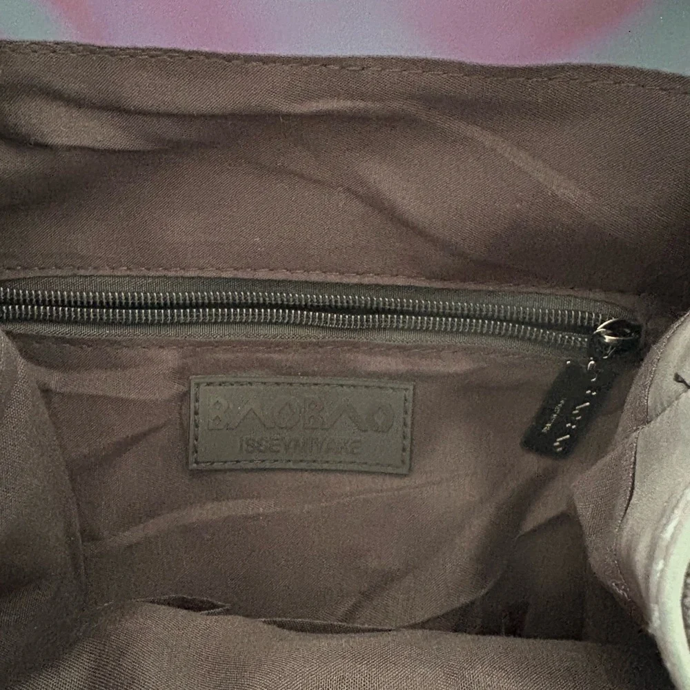 BAO BAO ISSEY MIYAKE Holographic Geometric Prism PVC Backpack Drawstring Flap - Picture 5 of 9